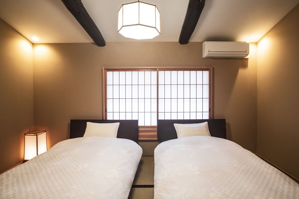 町屋　（ベッド + 布団） 客室5 | 鈴 西若松