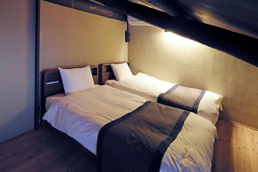 町屋　参の局 (ベッド + 布団) 客室8 | 平安宮内裏の宿