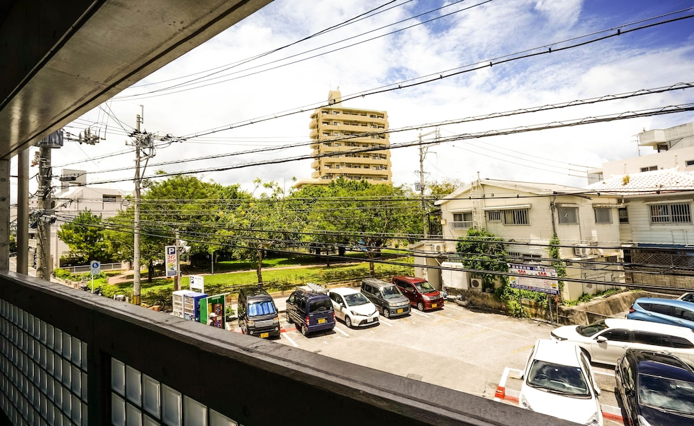 エグゼクティブ ルーム クイーンベッド 1 台 バルコニー バルコニーからの眺望0 | シークレット ハウス牧志