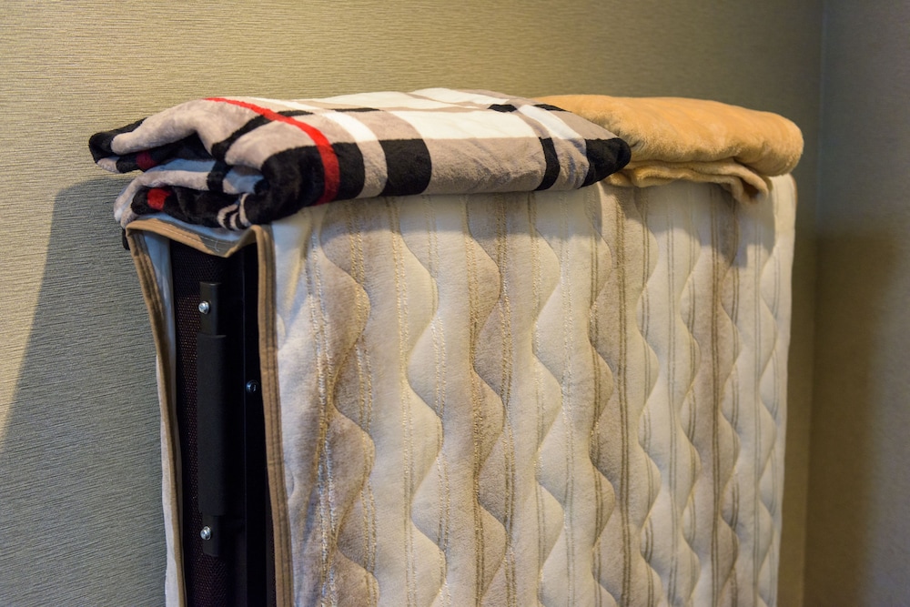 エグゼクティブ ルーム クイーンベッド 1 台 バルコニー 客室の設備とサービス3 | シークレット ハウス牧志