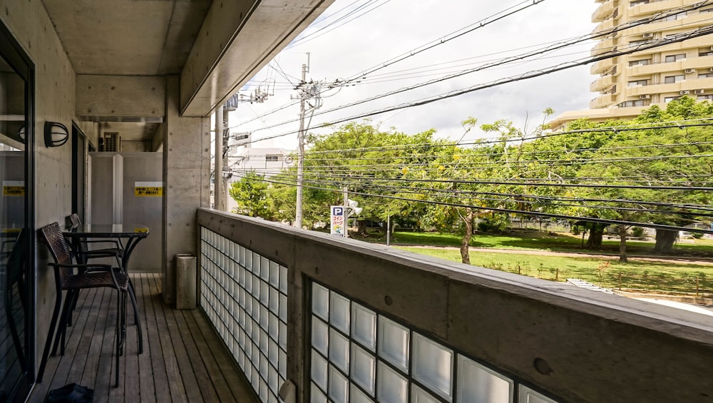 エグゼクティブ ルーム クイーンベッド 1 台 バルコニー バルコニー1 | シークレット ハウス牧志