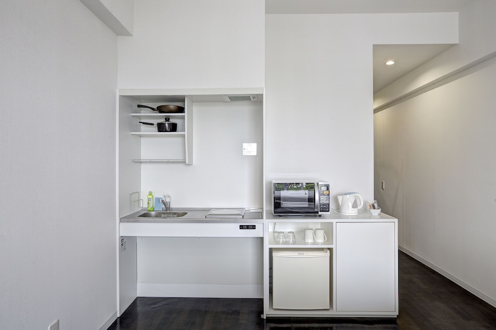 デラックス ツインルーム シングルベッド 2 台 車いす対応 禁煙 専用キッチン0 | ビーチフロントタワーミハマ by DSH