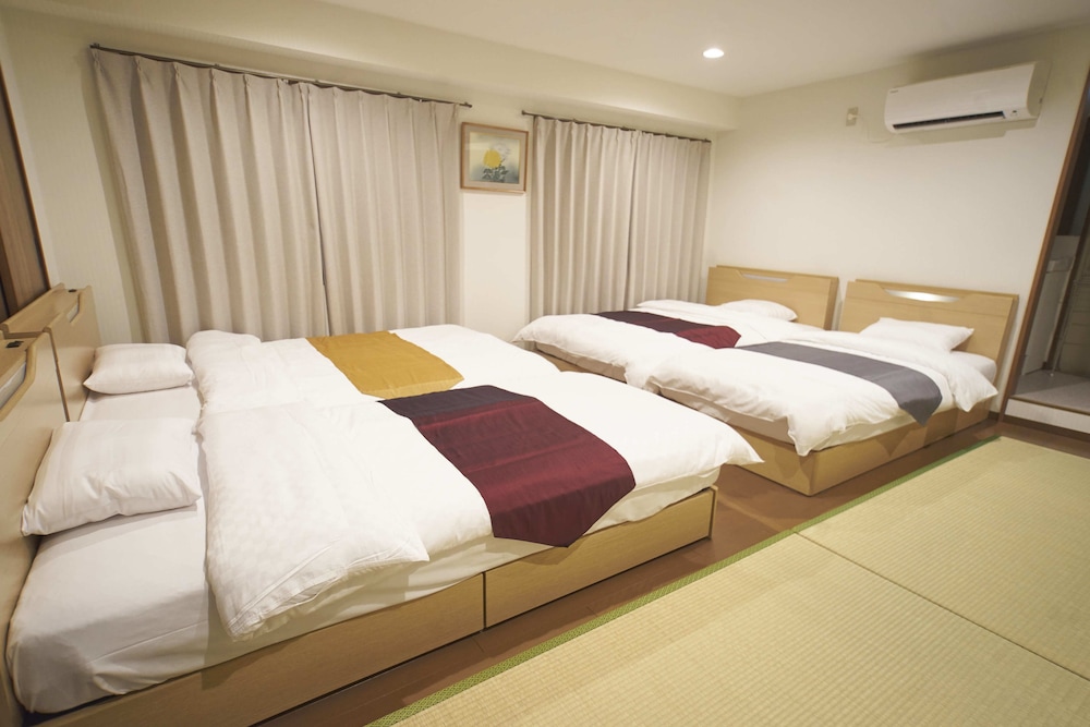 スタンダード ファミリールーム (シングルベット2 台、セミダブルベット2台) 客室4 | さらんばん