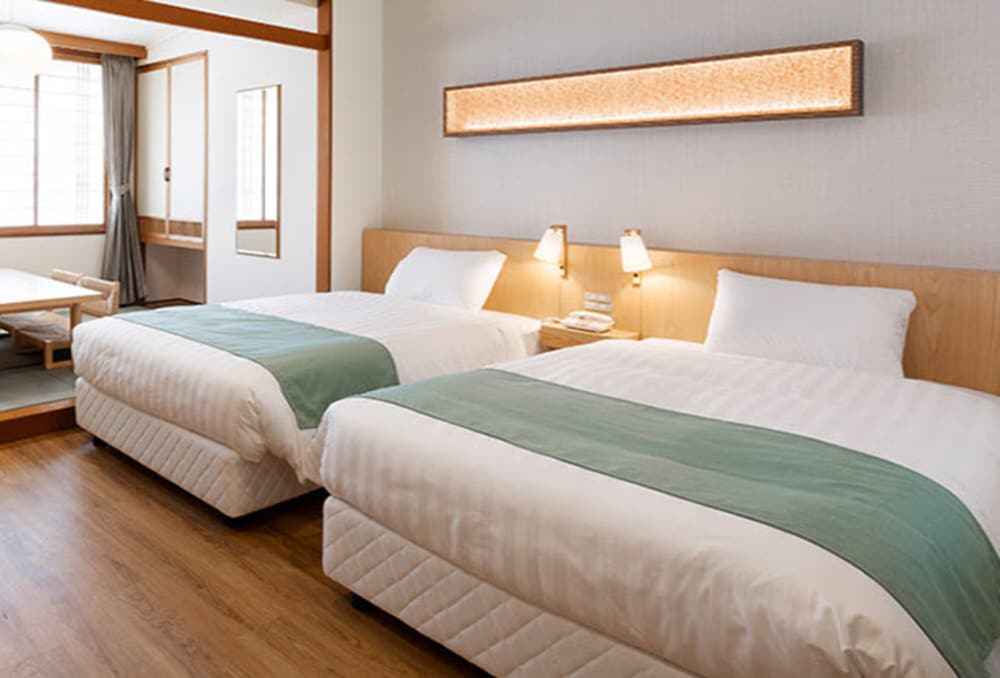 ユニバ-サルツインルーム 客室2 | きたゆざわ 森のソラニワ