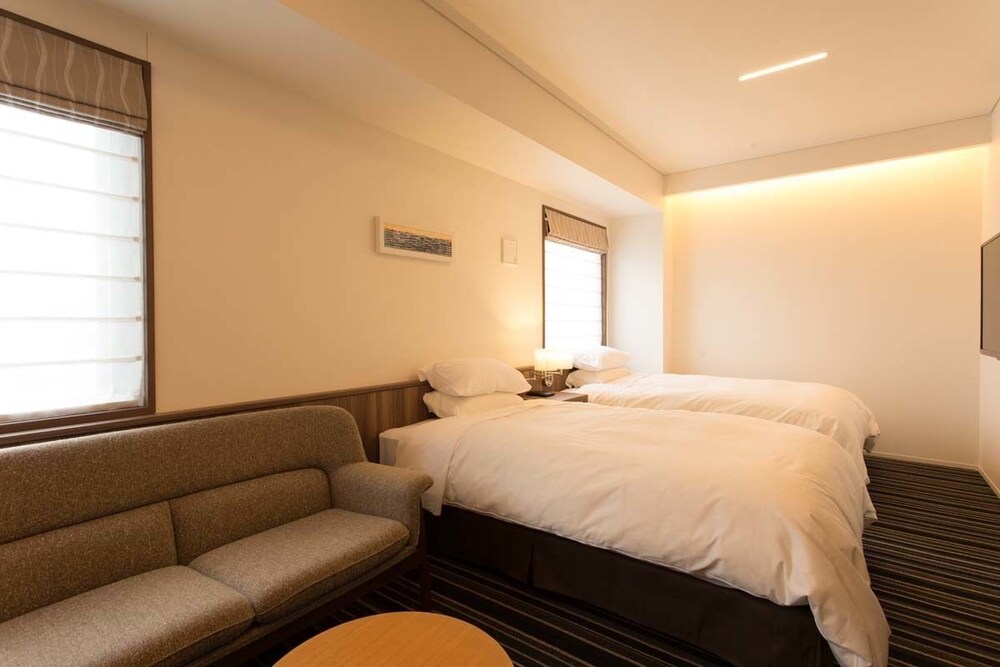 スタンダード ツインルーム シングルベッド 2 台 バリアフリー 禁煙 | 大船渡プラザホテル