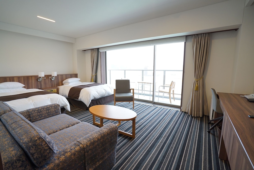 デラックス ツインルーム シングルベッド 2 台 禁煙 客室1 | 大船渡プラザホテル