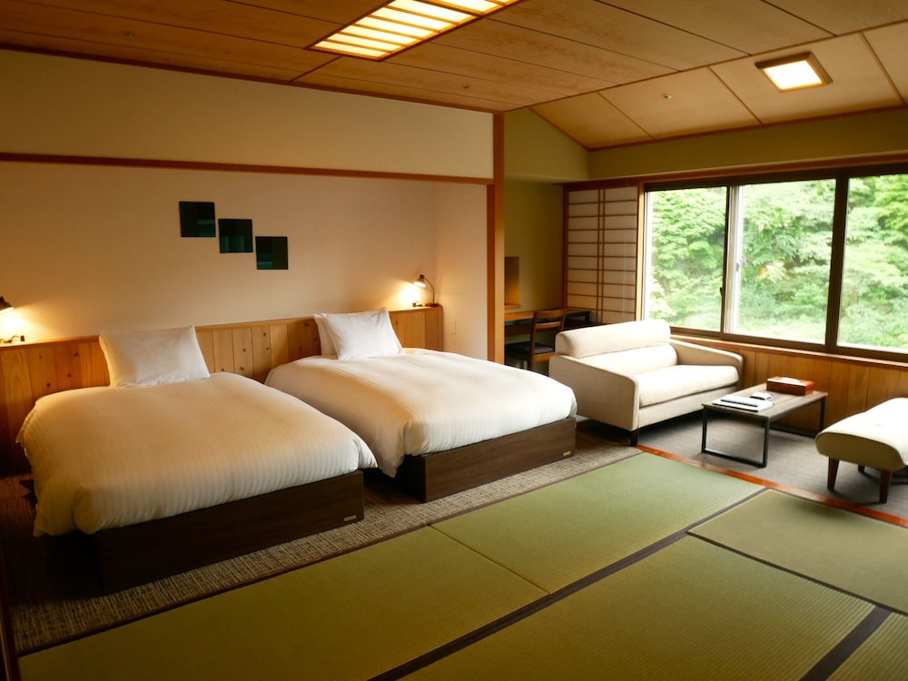 【渓流側和ベッド】別館◆2ベット セパレートバス・トイレ付 | 湯瀬ホテル