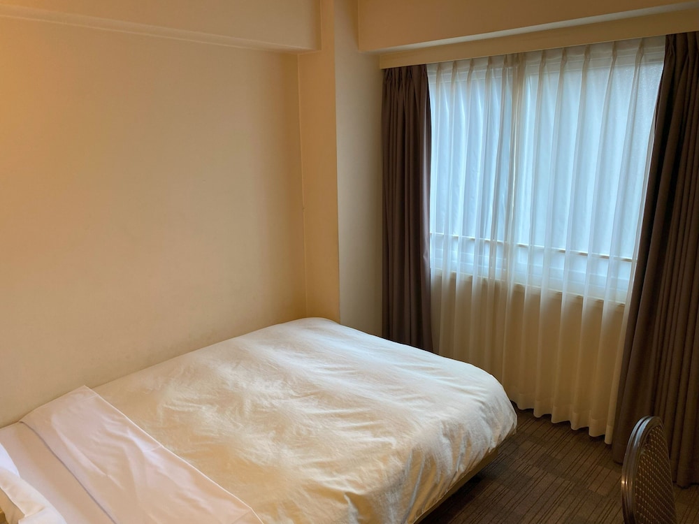 セミダブルルーム 喫煙可 | ホテルクラウンヒルズ熊本