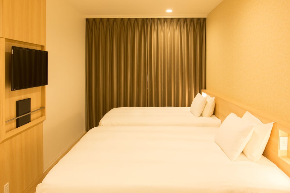 ラグジュアリー ツインルーム ダブルベッド 2 台 禁煙 客室1 | 住一 HOTEL 関空店
