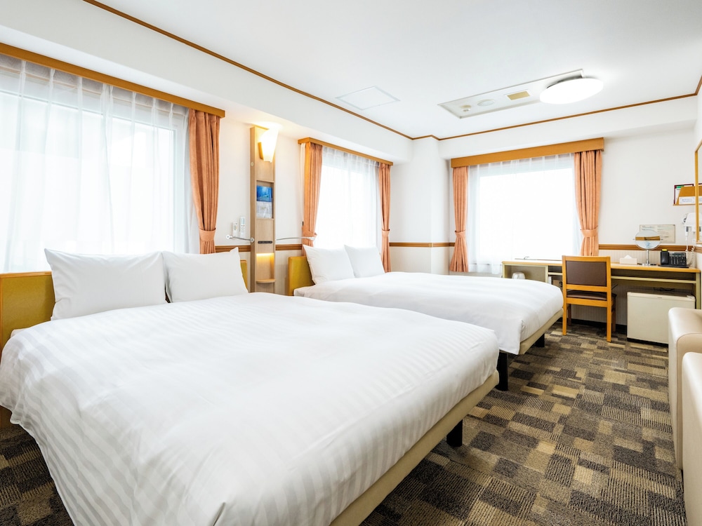 デラックス ツインルーム 喫煙可 | 東横INN 中部国際空港 1