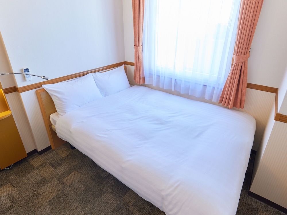 エコノミー ダブルルーム 喫煙可 客室1 | 東横 INN 大阪阪急十三駅西口 1