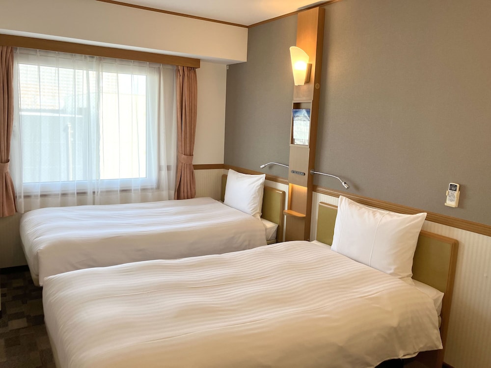 スタンダード ツインルーム シングルベッド 2 台 喫煙可 | 東横 INN 守谷駅前