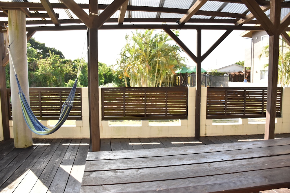 1号店のエクストラウッドデッキタイプ (ダブルベッド2台/3名以降はお布団配置) バルコニー0 | 美ら海ビレッジ