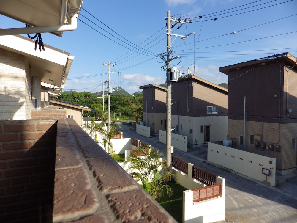 1号店のレギュラータイプ (ダブルベッド2台/3名以降はお布団配置) バルコニーからの眺望0 | 美ら海ビレッジ