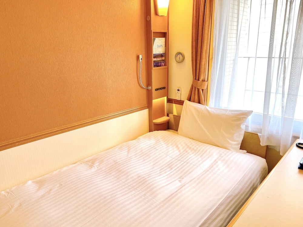 セパレートツイン 喫煙可 客室2 | 東横INN梅田中津 1