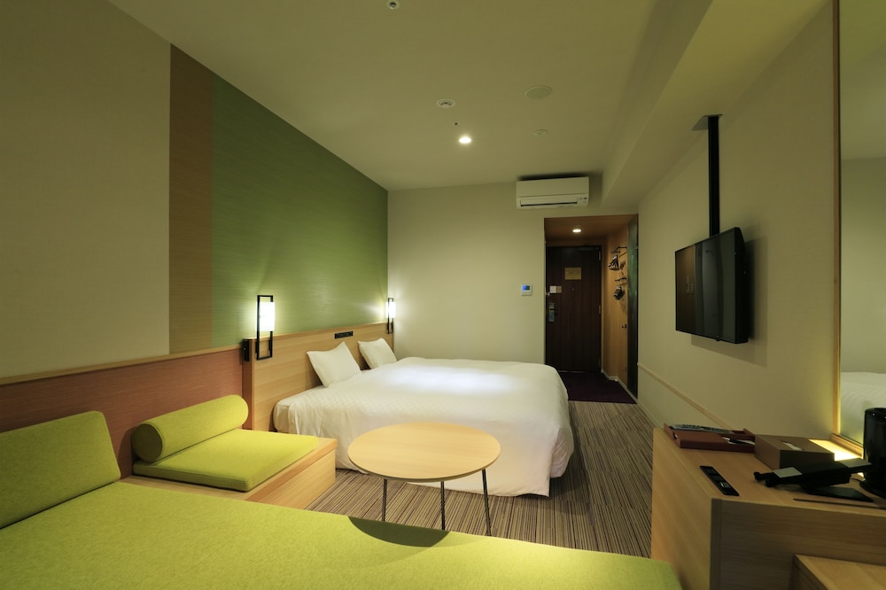 エグゼクティブデラックスキング リバーサイド ハイフロア　禁煙（キングベッド1台＋ソファベッド1台） 客室1 | ザ シンギュラリホテル & スカイスパ アット ユニバーサル・スタジオ・ジャパン