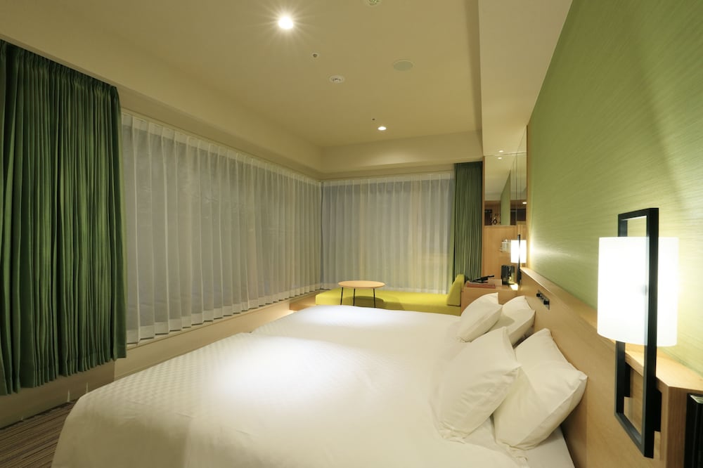 コーナーソファツイン ハイフロア　禁煙 客室5 | ザ シンギュラリホテル & スカイスパ アット ユニバーサル・スタジオ・ジャパン