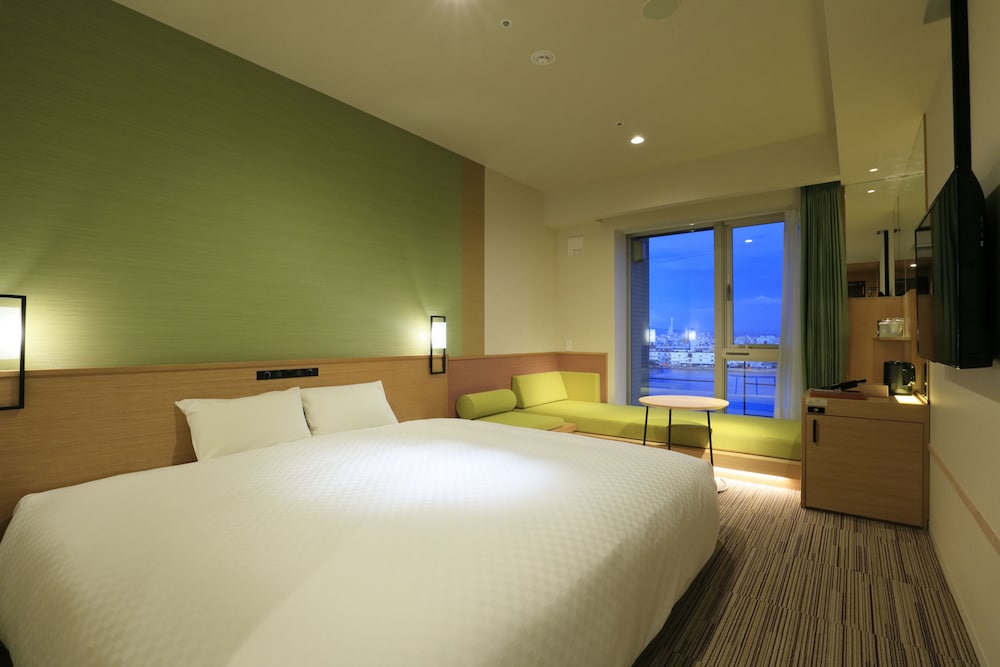 エグゼクティブデラックスキング リバーサイド ハイフロア　禁煙（キングベッド1台＋ソファベッド1台） | ザ シンギュラリホテル & スカイスパ アット ユニバーサル・スタジオ・ジャパン