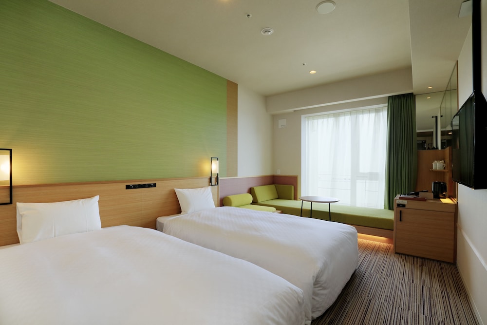 エグゼクティブソファツイン ハイフロア　禁煙（シングルベッド2台＋ソファベッド1台） | ザ シンギュラリホテル & スカイスパ アット ユニバーサル・スタジオ・ジャパン