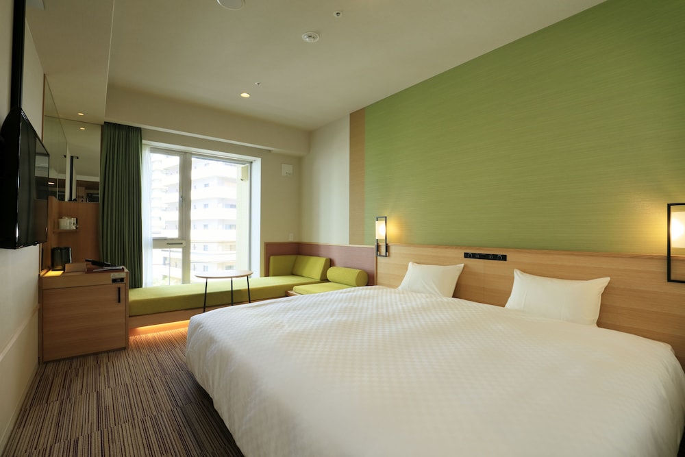 エグゼクティブデラックスキング　禁煙（キングベッド1台＋ソファベッド1台） | ザ シンギュラリホテル & スカイスパ アット ユニバーサル・スタジオ・ジャパン