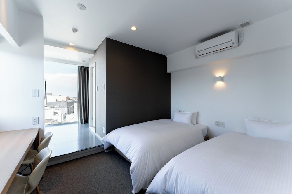 コーナーツインルーム 禁煙 客室2 | カナメインタテマチ