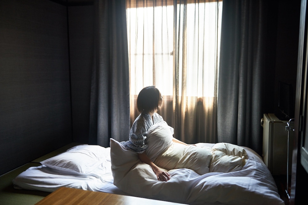 スタンダード ルーム 共用バスルーム 客室2 | 層雲峡温泉 ホテル雲井