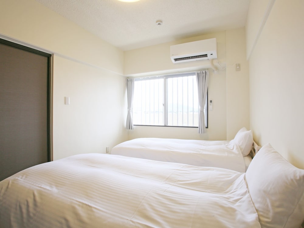 スタンダード(ツインルーム+和室)[禁煙] 客室3 | スカイククル石垣島