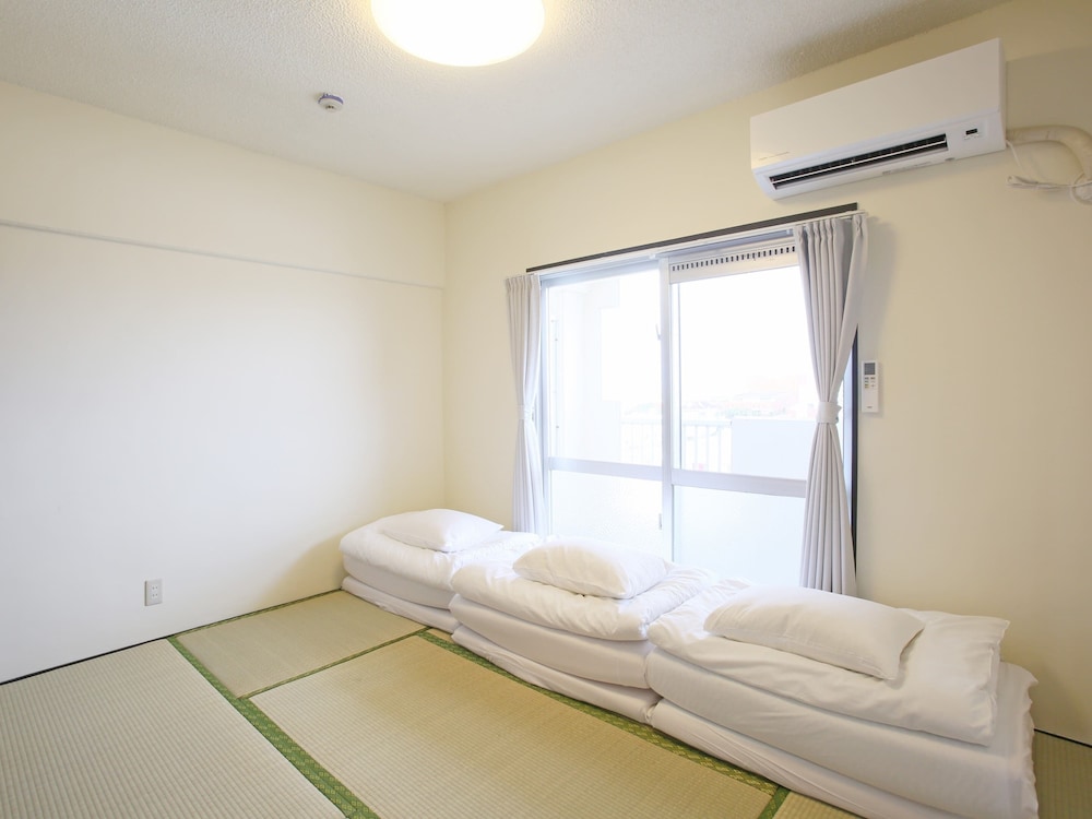 スタンダード(ツインルーム+和室)[禁煙] 客室1 | スカイククル石垣島