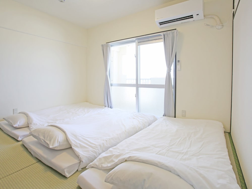スタンダード(ツインルーム+和室)[禁煙] 客室2 | スカイククル石垣島