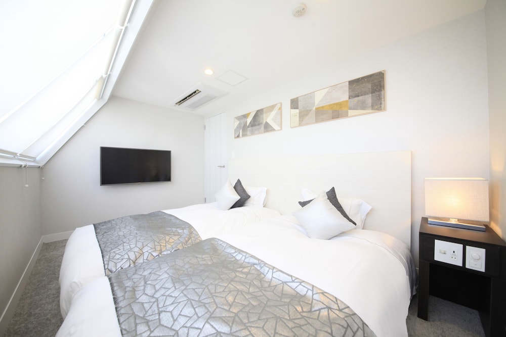 ペントハウスメゾネットファミリースイートルーム 禁煙 (セミダブルベッド2台)<大人3名様よりエクストラベッドをご用意> 客室0 | ザ・センチュリオンホテル クラシック赤坂