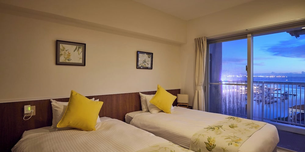 ファミリー ルーム 禁煙 客室42 | シーサイドコンドミニアム ラナ北谷