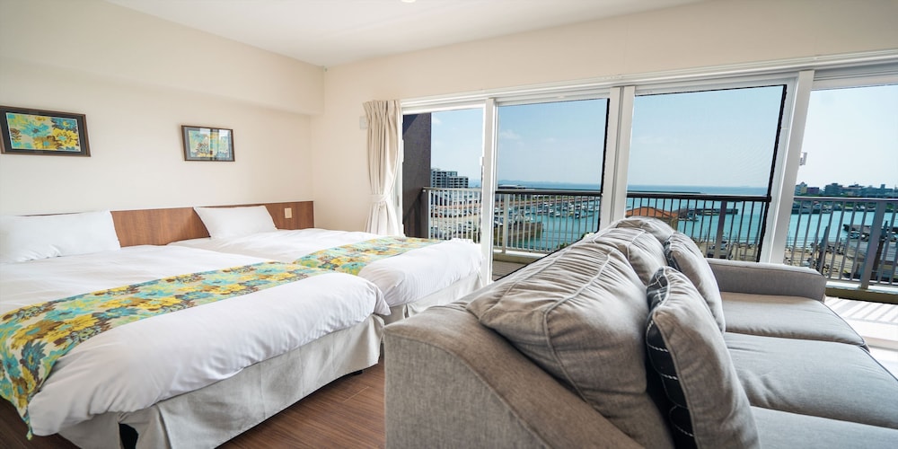 スーペリア ツインルーム 禁煙 ハーバービュー 客室1 | シーサイドコンドミニアム ラナ北谷