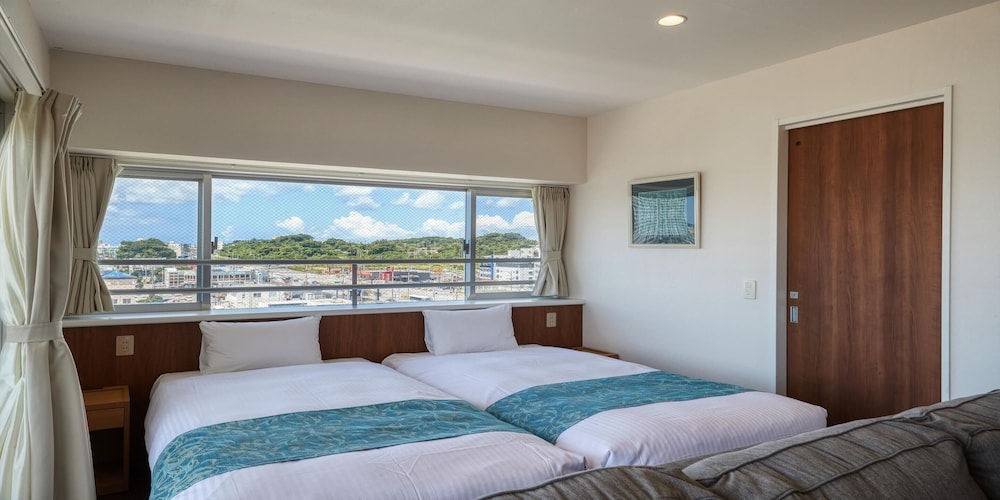 スーペリア ツインルーム 禁煙 ハーバービュー 客室11 | シーサイドコンドミニアム ラナ北谷