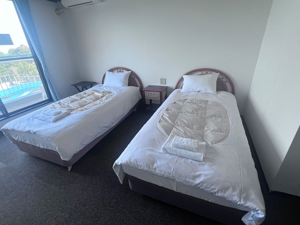 ツインベッドルーム 4階 エレベーターなし 海側 禁煙 | ペンション白浜 ビッグフィッシャー・クラブ