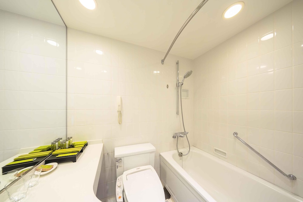 エグゼクティブ ルーム シングルベッド 2 台 バスルーム1 | ヒルトン福岡シーホーク