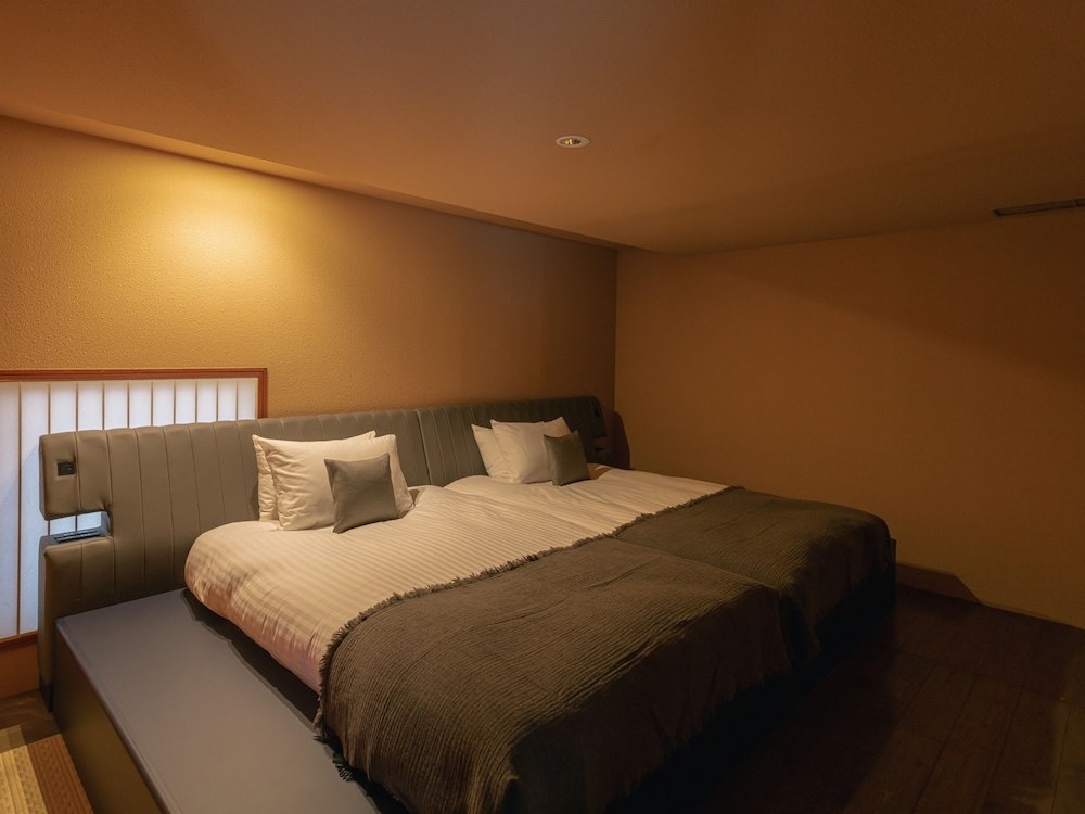 半露天温泉ジュニアスイート 客室1 | 小樽リトリート 蔵群 by 温故知新