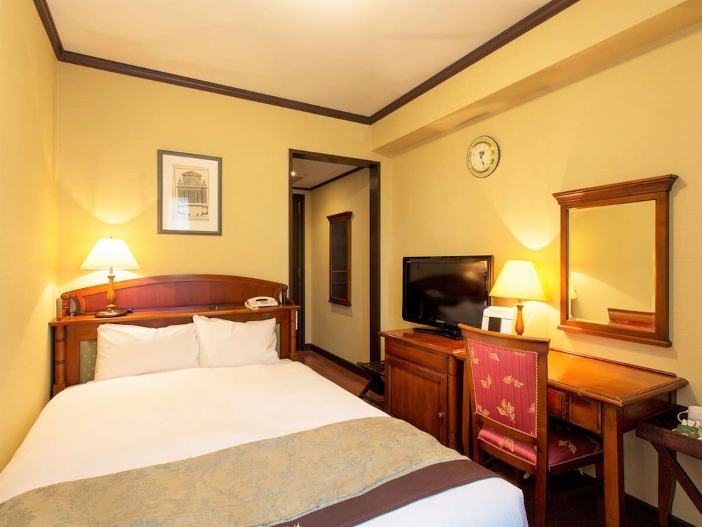 セミダブルルーム 禁煙 (ベッド幅: 140cm) | ホテルモントレ大阪