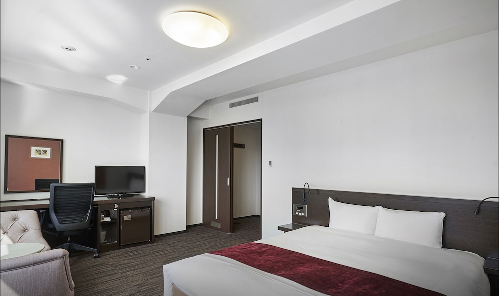 プレミアム ダブルルーム クイーンベッド 1 台 喫煙可 客室4 | ダイワロイネットホテル 岡山駅前