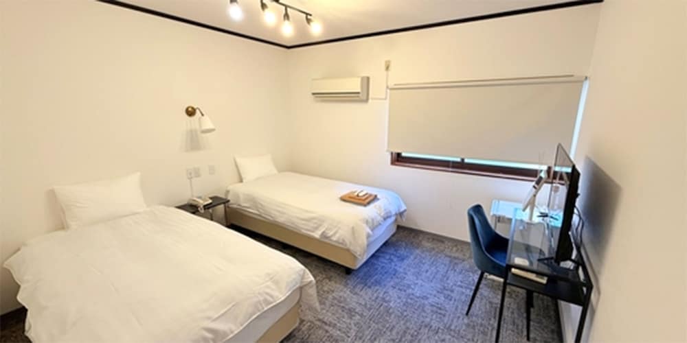 スタンダード ツインルーム シングルベッド 2 台 禁煙 | 励明園