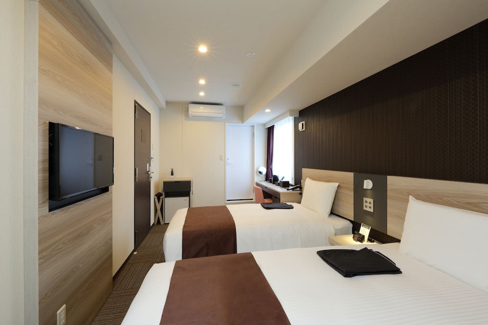 ツインルーム 禁煙 (添い寝分お子様のお食事代は無料) 客室1 | くれたけインプレミアム名古屋納屋橋