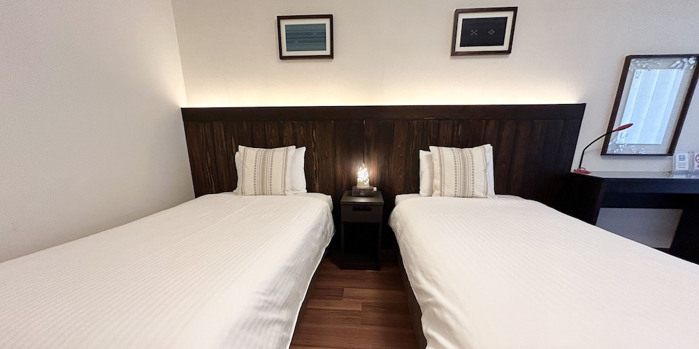 ツインルーム 禁煙 客室1 | ペンション サンセットビーチ