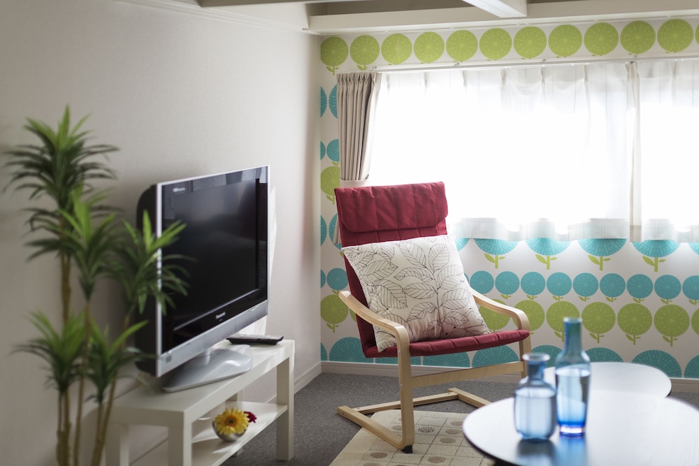 プレミアムスイート リビング エリア3 | The Metropolitan