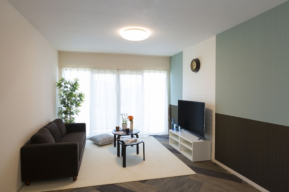 デラックス ルーム リビングルーム3 | The Metropolitan