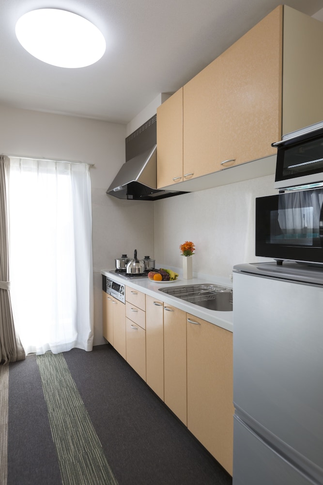 プレミアムスイート 専用キッチン0 | The Metropolitan