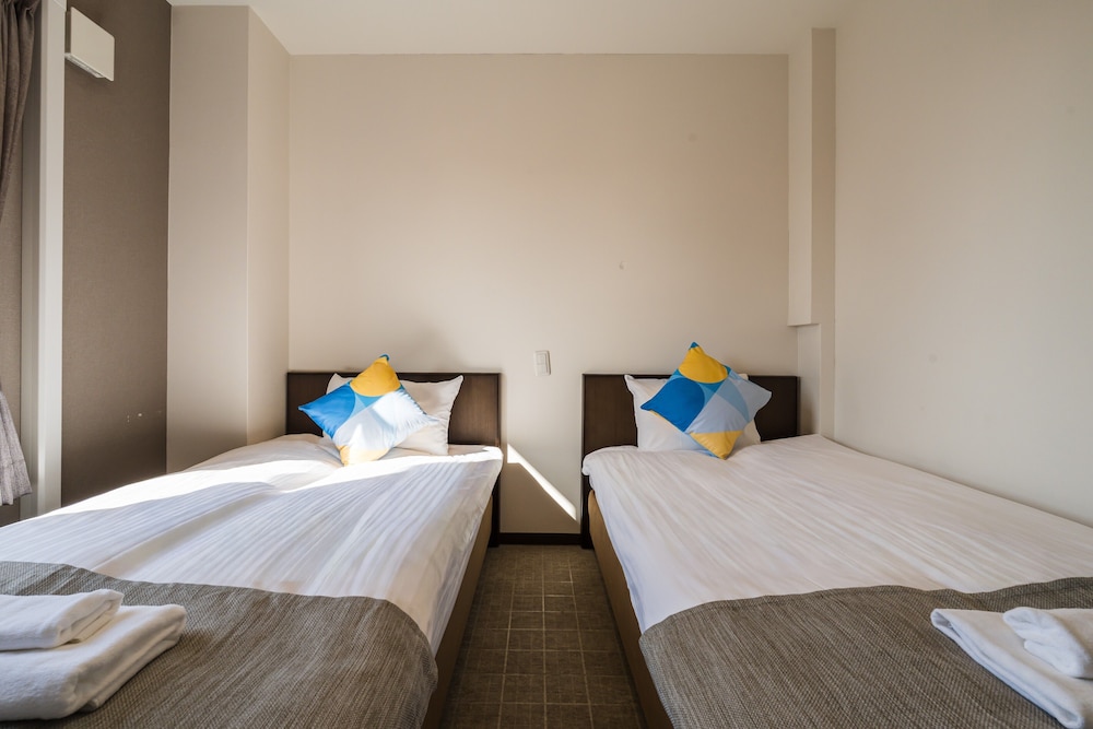 客室1 | OKINI - DOYANEN HOTELS