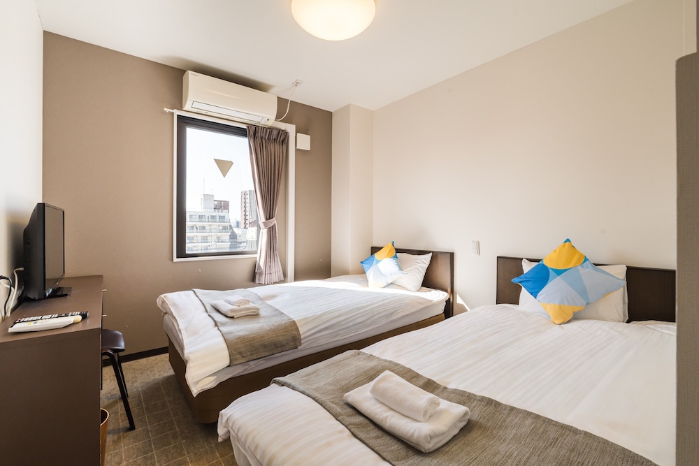 ツインルーム 客室3 | OKINI - DOYANEN HOTELS