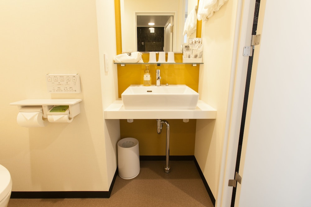 シアタールーム トリプル 禁煙 バスルーム1 | 変なホテル東京 羽田