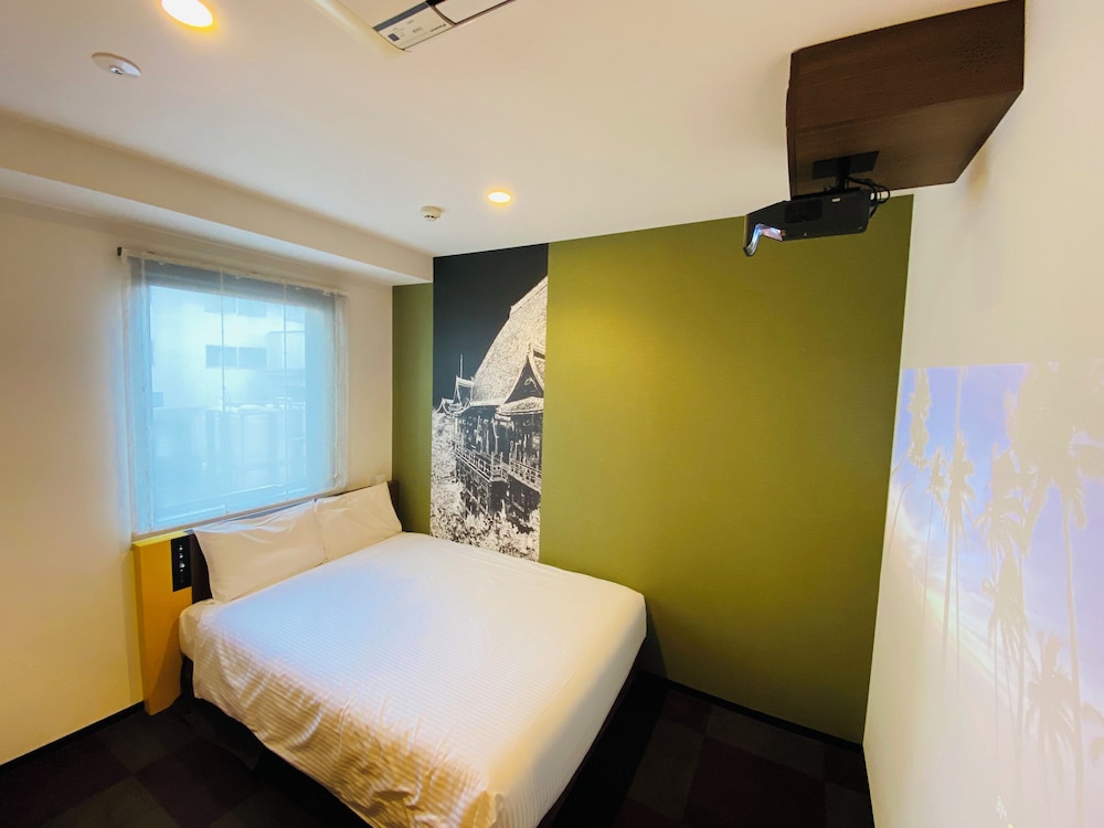 シアタールーム セミダブル 禁煙 客室2 | 変なホテル東京 羽田