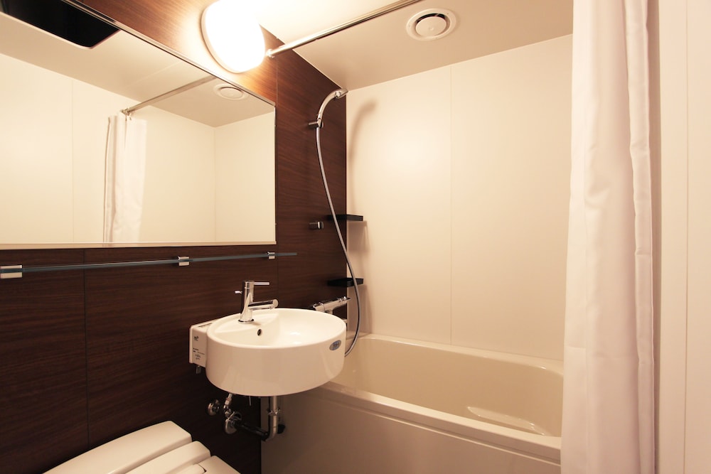 スタンダード ダブルルーム 喫煙可 バスルーム0 | スマイルホテルプレミアム大阪本町