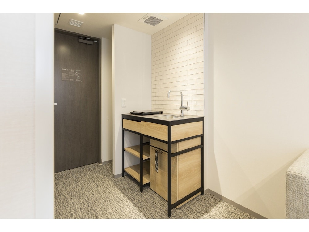 レジデンシャルダブルルーム(クイーンベッド1台)2名利用 禁煙 客室2 | 東急ステイ高輪 (泉岳寺駅前)